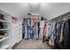 Spacious walk-in closet with custom shelving and ample storage at 10889 Weston Dr, Carmel, IN 46032