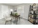 Well-lit office space with a modern desk, chairs, and stylish shelving at 126 S 3Rd Ave, Beech Grove, IN 46107