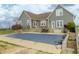 Backyard featuring covered pool and large stone patio at 13151 Walters Rd, Martinsville, IN 46151