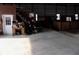 View of the spacious barn interior with concrete floor, showing potential for various uses at 13151 Walters Rd, Martinsville, IN 46151
