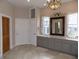 Bathroom with double vanity and large mirror with a chandelier at 13151 Walters Rd, Martinsville, IN 46151