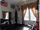 Bright exercise room with punching bag and weight training equipment at 13151 Walters Rd, Martinsville, IN 46151