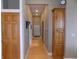Hallway with hardwood flooring and lots of doors at 13151 Walters Rd, Martinsville, IN 46151