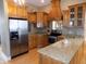 Well-equipped kitchen featuring stainless steel appliances, granite countertops, and a large island at 13151 Walters Rd, Martinsville, IN 46151