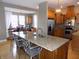 Kitchen with stainless appliances, granite countertops, island and breakfast bar at 13151 Walters Rd, Martinsville, IN 46151