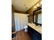 Bathroom featuring a dark vanity with a white countertop, and a shower with a curtain at 13993 Whittier Dr, Fishers, IN 46038
