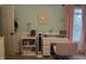 Bright bedroom boasts a large window, a work desk, and fresh paint at 13993 Whittier Dr, Fishers, IN 46038