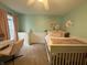 Bright bedroom with a ceiling fan, fresh paint, and decorative flowers at 13993 Whittier Dr, Fishers, IN 46038