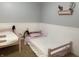 bedroom with two beds and wall decor at 13993 Whittier Dr, Fishers, IN 46038