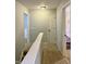 Hallway featuring neutral walls, carpeted floors, and doors leading to various rooms at 13993 Whittier Dr, Fishers, IN 46038