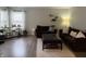 Comfortable living room with two sofas, hardwood floors, and modern decor at 13993 Whittier Dr, Fishers, IN 46038