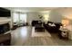 Bright living room featuring fireplace, hardwood floors, and comfortable seating at 13993 Whittier Dr, Fishers, IN 46038