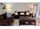 Warm living room with comfortable seating, hardwood floors, and cozy lighting at 13993 Whittier Dr, Fishers, IN 46038