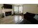Comfortable living room featuring a fireplace and ample seating at 13993 Whittier Dr, Fishers, IN 46038