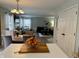 Bright, open-concept living space featuring hardwood floors and a neutral color palette at 13993 Whittier Dr, Fishers, IN 46038