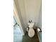 Bright half bathroom with updated fixtures and tiled floors at 13993 Whittier Dr, Fishers, IN 46038