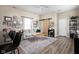 Cozy living room with ample seating, a decorative rug, and plenty of natural light at 1429 Linden St, Indianapolis, IN 46203