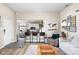 Open-concept living space with a view into the well-equipped kitchen and bar seating at 1429 Linden St, Indianapolis, IN 46203