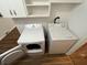Laundry room with white washer and dryer at 1509 N Mann Ave, Muncie, IN 47304