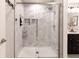 Modern bathroom showcasing a walk-in shower with a sleek glass door and tiled walls at 15493 Kennewick, Noblesville, IN 46062
