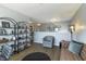 Second floor living room features modern decor, stylish seating, and plenty of natural light at 15493 Kennewick, Noblesville, IN 46062