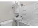 Bathroom featuring black fixtures, a shower-tub combo, and a toilet at 1836 N Riley Ave, Indianapolis, IN 46218