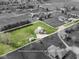 An aerial view showcases this home's vast land and separate garage on the property at 1873 S 510 E, Franklin, IN 46131