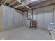 Unfinished basement with concrete walls, water filtration system, and utilities at 1873 S 510 E, Franklin, IN 46131