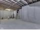 Unfinished basement with concrete walls, exposed wooden beams, and utility equipment at 1873 S 510 E, Franklin, IN 46131
