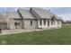 Charming brick and stucco home featuring a well-maintained lawn and welcoming entryway at 1873 S 510 E, Franklin, IN 46131