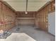 Spacious garage featuring wood framing, a storage loft, and room for vehicle and tool storage at 1873 S 510 E, Franklin, IN 46131