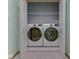 Laundry room with white appliances and a wire shelf at 1873 S 510 E, Franklin, IN 46131