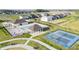 Aerial view of community amenities including pool, pavilions, seating, and a tennis court at 18769 Moray St, Westfield, IN 46074