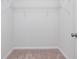 Spacious walk-in closet with wire shelving and neutral carpet at 18769 Moray St, Westfield, IN 46074