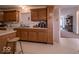 Well-equipped kitchen featuring an island, ample storage, and views into other living spaces at 2179 W Van Arsdall Ct, Columbus, IN 47201
