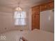 Bright kitchen featuring a window and an island with breakfast bar seating at 2179 W Van Arsdall Ct, Columbus, IN 47201