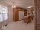 Spacious kitchen with an island, breakfast bar, and plenty of natural light at 2179 W Van Arsdall Ct, Columbus, IN 47201
