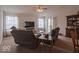 Bright living room with comfortable seating, a tv and an outdoor view at 2179 W Van Arsdall Ct, Columbus, IN 47201