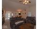 Large living room with vaulted ceilings, comfortable seating, and open floor plan at 2179 W Van Arsdall Ct, Columbus, IN 47201