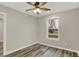 Neutral bedroom featuring modern ceiling fan, recessed lighting, and large window at 2264 Walnut W St, Greenfield, IN 46140