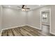 Bedroom with neutral walls, luxury vinyl plank flooring, and plenty of natural light at 2264 Walnut W St, Greenfield, IN 46140