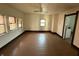 Empty room featuring hardwood floors and white walls at 2338 N Harding St, Indianapolis, IN 46208