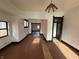 Empty living room featuring hardwood floors and white walls at 2338 N Harding St, Indianapolis, IN 46208