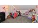 Charming bedroom with sloped ceilings, a bed with polka dot bedding, and a playful decor, perfect for  at 260 Christina Dr, Whiteland, IN 46184