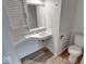 Clean bathroom with integrated sink, vanity, and toilet at 268 E Hoover Dr, Princess Lakes, IN 46164