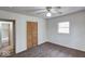 Bedroom with closet, ceiling fan, and view to adjacent bathroom at 268 E Hoover Dr, Princess Lakes, IN 46164