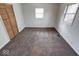 Neutral bedroom features a closet with bi-fold doors and two windows at 268 E Hoover Dr, Princess Lakes, IN 46164