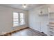 Bright dining area features natural light, laminate flooring, and creates a welcoming space for meals and gatherings at 268 E Hoover Dr, Princess Lakes, IN 46164