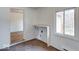 Unfurnished room with view of other room and access to outside at 268 E Hoover Dr, Princess Lakes, IN 46164