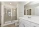 Bright bathroom featuring a glass shower door, white vanity, and modern fixtures at 2766 Ruffian Dr, Westfield, IN 46074